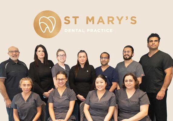 St-Marys-Dental-Practice-stafford-dental-team-together-over-logo