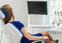 young-girl-patient-waiting-doctor-dental-chair-clinic-tooth-stain-removal